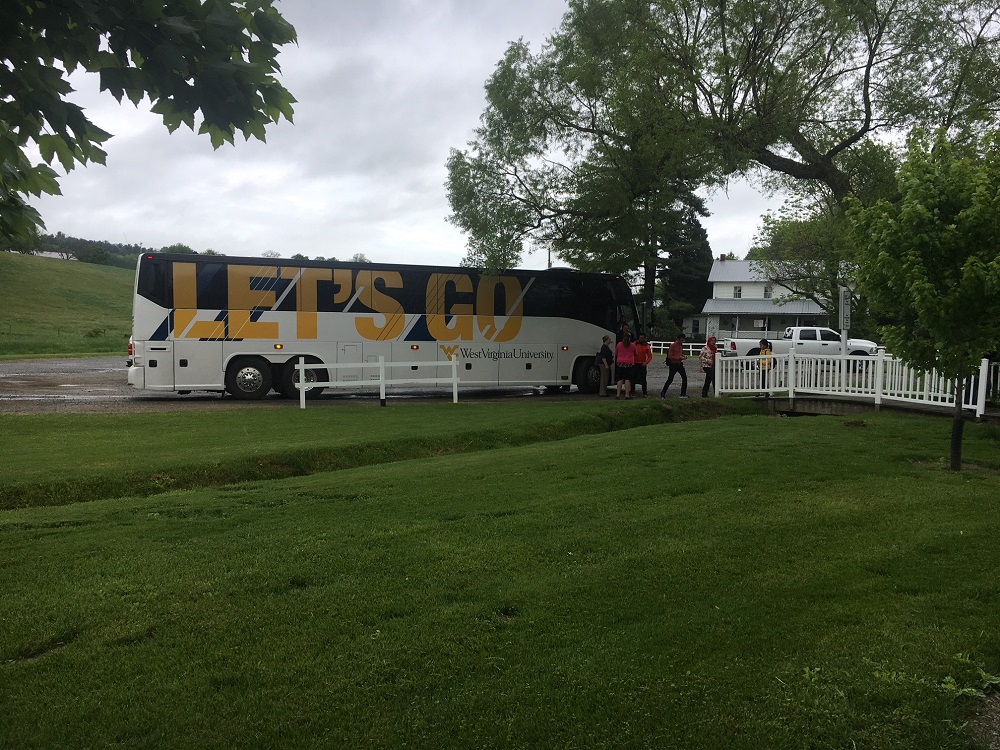  WVU buses arriving at Yoder 's Amish Home